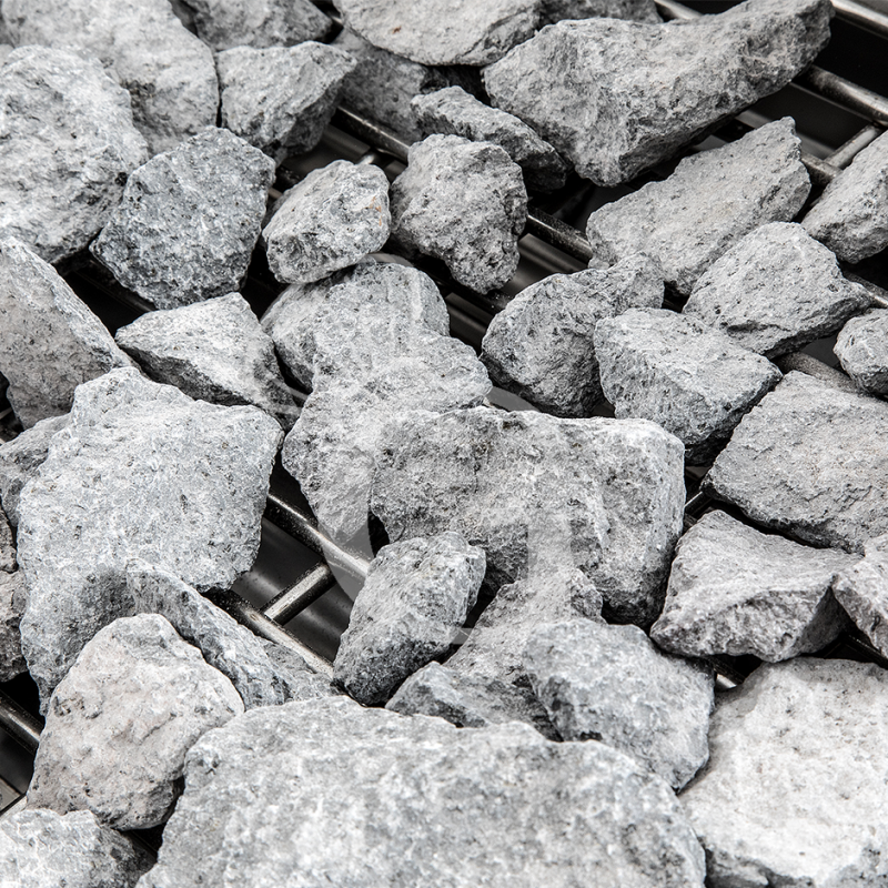 Parrilla de gas y piedra volcánica sobre mueble, 1 zona de cocción y 900 mm de profundidad